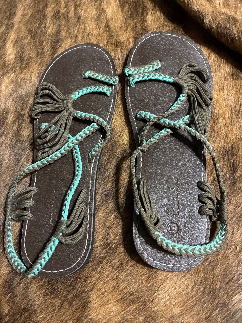 Plaka sandals in size 10